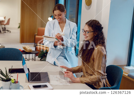 Engaging and Collaborative Business Meeting Set in a Modern Office Environment for Success Engaging and Collaborative Business Meeting Set in a Modern Office Environment for Success 126367126