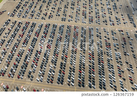 New cars parked on automotive factory parking lot for worldwide export. Dealer vehicle inventory business commercial 126367159