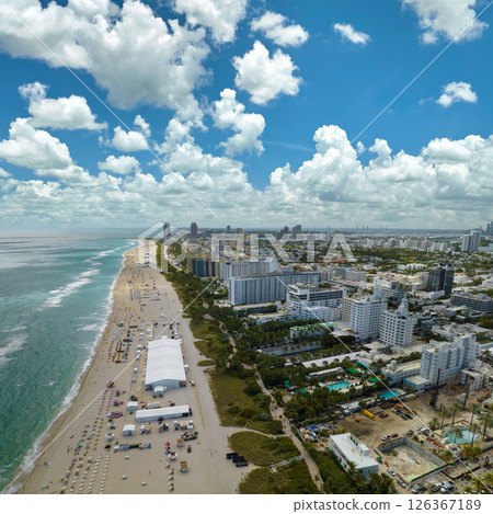 Miami Beach city with high luxury hotels and condos and sandy beachfront 126367189