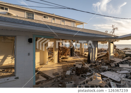 Hurricane Milton storm surge severe damage to waterfront house on Manasota Key, Florida. Destroyed home on gulf coast 126367239