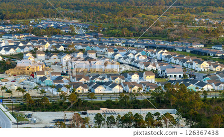 Houses under construction in American suburbs. Development of residential housing. Real estate market in the USA Houses under construction in American suburbs. Development of residential housing. Real estate market in the USA 126367438