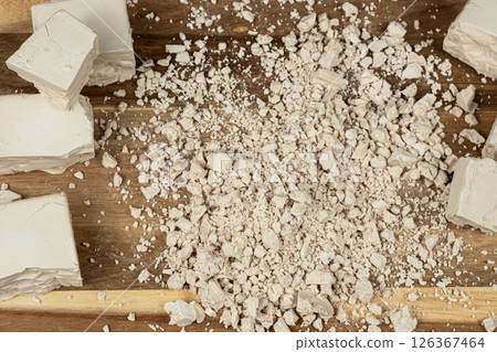 Compressed fresh yeast cubes close-up on a wooden background 126367464