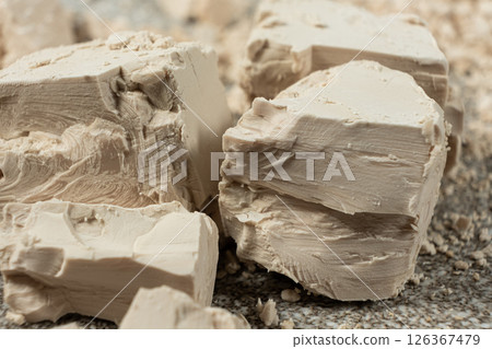 Compressed fresh yeast cubes close-up 126367479