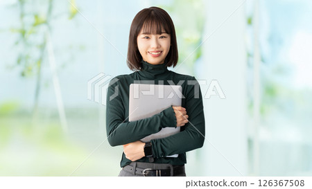 Woman with a laptop / business woman Woman with a laptop / business woman 126367508