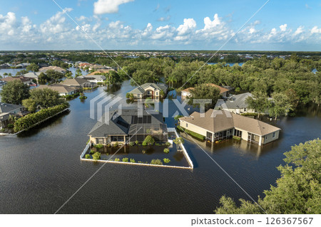Flooded residential area with underwater houses from hurricane rainfall water in Florida suburban community. Aftermath of natural disaster in southern USA 126367567