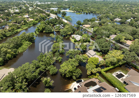 Flooded houses from hurricane Debby rainfall water in residential community in Sarasota, Florida. Aftermath of natural disaster in USA south 126367569