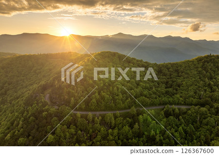 Evening landscape of Blue Ridge Parkway near Mount Mitchell in summer season. Mountain pass road in North Carolina Appalachian mountains, USA Evening landscape of Blue Ridge Parkway near Mount Mitchell in summer season. Mountain pass road in North Carolina Appalachian mountains, USA 126367600