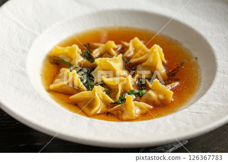 Portion of italian ravioli dumplings dish Portion of italian ravioli dumplings dish 126367783
