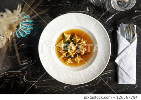 Portion of italian ravioli dumplings dish Portion of italian ravioli dumplings dish 126367784