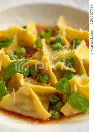 Portion of italian ravioli dumplings dish Portion of italian ravioli dumplings dish 126367786