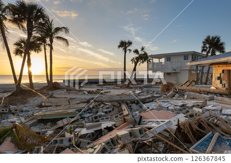 Destroyed houses on ocean coast. Hurricane Milton consequences in Englewood, Florida. Storm surge severe damage Destroyed houses on ocean coast. Hurricane Milton consequences in Englewood, Florida. Storm surge severe damage 126367845