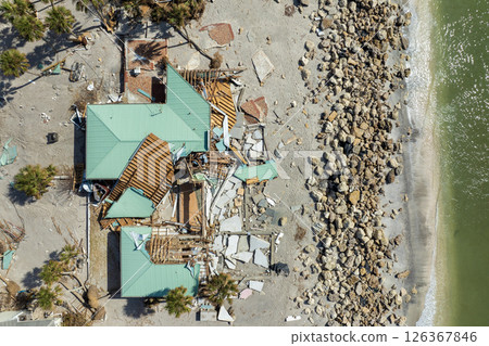 Destroyed houses on ocean coast. Hurricane Milton consequences in Englewood, Florida. Storm surge severe damage Destroyed houses on ocean coast. Hurricane Milton consequences in Englewood, Florida. Storm surge severe damage 126367846