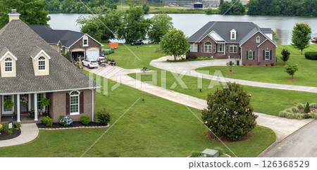 American community houses in US suburbs. View from above of large residential homes in small town in rural Tennessee American community houses in US suburbs. View from above of large residential homes in small town in rural Tennessee 126368529