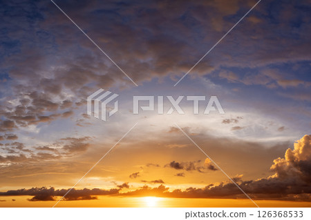 Amazing evening skyscape. Sunset sky with bright colorful clouds Amazing evening skyscape. Sunset sky with bright colorful clouds 126368533