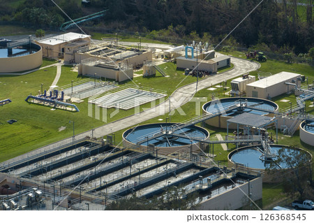Aerial view of water treatment factory at city wastewater cleaning facility. Purification process of removing undesirable chemicals, suspended solids and gases from contaminated liquid 126368545