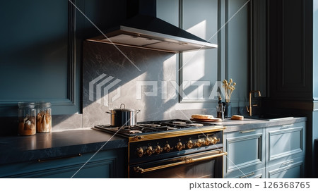 Luxurious sunlit kitchen with elegant blue cabinets and modern appliances. Luxurious sunlit kitchen with elegant blue cabinets and modern appliances. 126368765