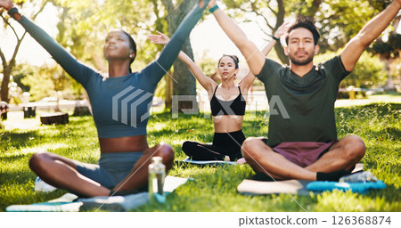 Meditation, yoga and group in park for mindfulness, healing aura or spiritual mental health. Zen, yogi people and peaceful break in nature with fresh air, energy balance or relax chakra outdoors 126368874