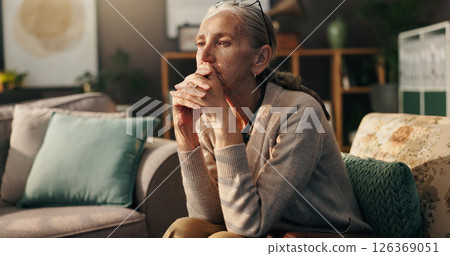 Senior woman, thinking and doubt with memory on sofa for dream or ambition at old age home. Elderly, female person or retired pensioner with wonder or thought on chair for nostalgia or past at house Senior woman, thinking and doubt with memory on sofa for dream or ambition at old age home. Elderly, female person or retired pensioner with wonder or thought on chair for nostalgia or past at house 126369051
