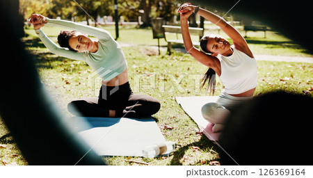 Outdoor, coach and women with stretching for yoga, holistic exercise and arms balance with peace. Nature, people and hands of yogi instructor for instructions, wellness and mindfulness with fitness Outdoor, coach and women with stretching for yoga, holistic exercise and arms balance with peace. Nature, people and hands of yogi instructor for instructions, wellness and mindfulness with fitness 126369164