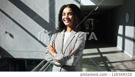 Smile, portrait and confident business woman in company for opportunity as talent acquisition specialist. Arms crossed, professional and happy human resources worker in corporate office in in Mexico 126369328