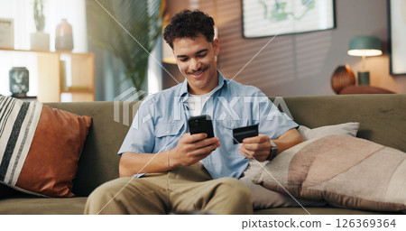 Home, online shopping and man with smartphone, card and payment for digital product, sale and browsing. House, customer and person with credit for ecommerce, living room and scroll for purchase Home, online shopping and man with smartphone, card and payment for digital product, sale and browsing. House, customer and person with credit for ecommerce, living room and scroll for purchase 126369364