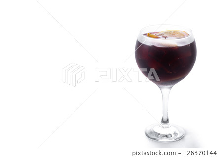 Refreshing Summer Citrus Fruit Sangria in crystal glass isolated on white background 126370144