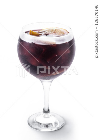 Refreshing Summer Citrus Fruit Sangria in crystal glass isolated on white background Refreshing Summer Citrus Fruit Sangria in crystal glass isolated on white background 126370146