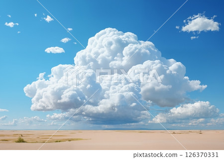 a large cumulus cloud over the desert, a beautiful landscape with blue sky as an abstract summer background 126370331