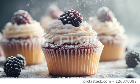 Blackberry Cupcake with Cream Frosting and Powdered Sugar 126370392