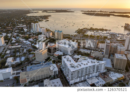 Above view of Sarasota city, Florida with waterfront office high-rise buildings. Development of housing and transportation in the US 126370521