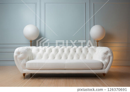 a white sofa, indoor, in front of empty wall background 126370691