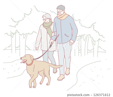 A couple is joyfully walking their dog together in the beautiful, peaceful nature 126371812