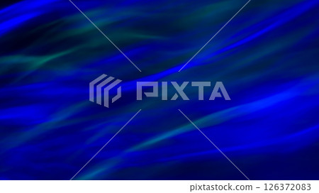 Defocused abstract green and blue background of speed camera movement over glowing lights. A pattern of flashes of light similar to the northern lights 126372083