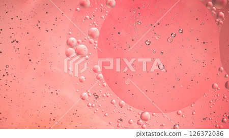 Abstract pink colorful background with oil on water surface. Oil drops in water abstract psychedelic, abstract image. 126372086