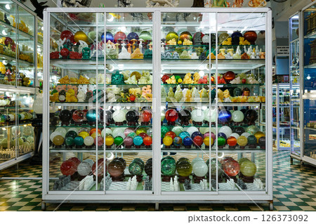 Vibrant Display of Stone Spheres and Carved Gemstone Figurines in Inside an Stone Shop, Vietnam 126373092