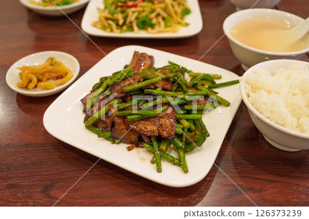 Chinese food, stir-fried garlic sprouts and larou (dried meat) 126373239
