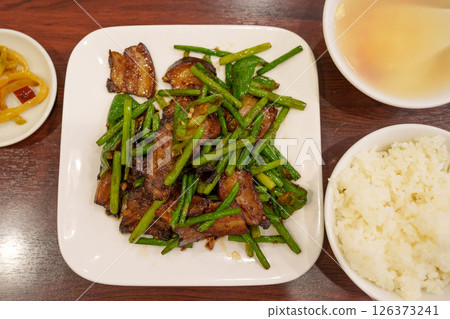 Chinese food, stir-fried garlic sprouts and larou (dried meat) Chinese food, stir-fried garlic sprouts and larou (dried meat) 126373241