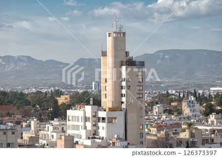 Nicosia cityscape on sunny day with Pentadactylos mountains in background. Cyprus 126373397