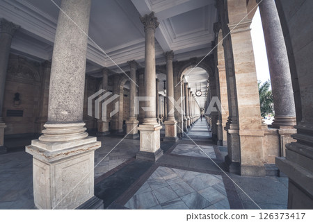 The Mill Colonnade showing its beautiful architecture with symmetry and columns in Karlovy Vary, Czech Republic The Mill Colonnade showing its beautiful architecture with symmetry and columns in Karlovy Vary, Czech Republic 126373417