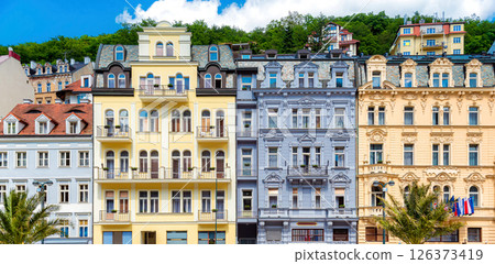 Karlovy vary spa town showing colorful facades of traditional buildings on a sunny day Karlovy vary spa town showing colorful facades of traditional buildings on a sunny day 126373419