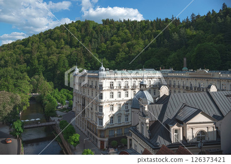 Tepla river flowing through Karlovy Vary with Hotel in background. Czech Republic 126373421