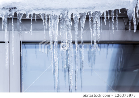 Icicles on the eaves. Icicles on the eaves. 126373973