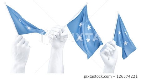 Hand holding flag of Federated States of Micronesia. Isolated 3d Rendering 126374221