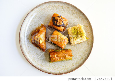 Aerial view of various types of baklava, including pistachio and hazelnut 126374291
