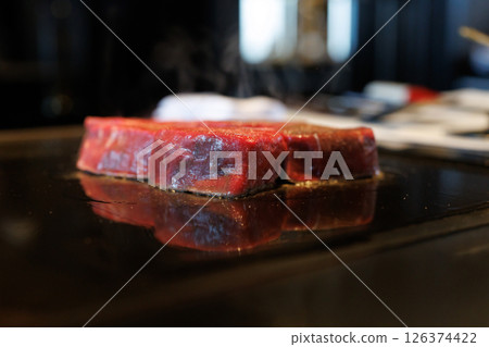 Bake a steak 126374422