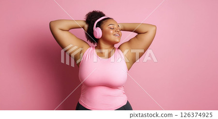 Plus size woman focused on training with battle ropes in the gym, showcasing strength and determination. Generated image 126374925