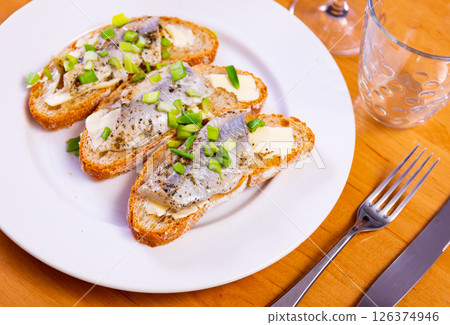 Sandwich with herring fish and butter Sandwich with herring fish and butter 126374946
