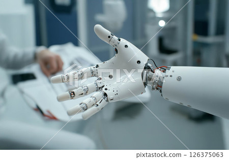 Robotics engineer calibrating a robotic prosthetic hand, showcasing advanced medical technology. Generated image 126375063