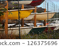 Colorful Boats In Storage By The Beach 126375696