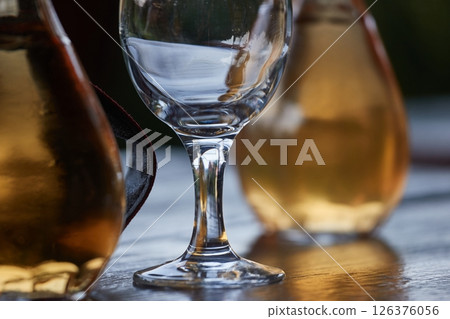 Drinking wine on a summer evening Drinking wine on a summer evening 126376056